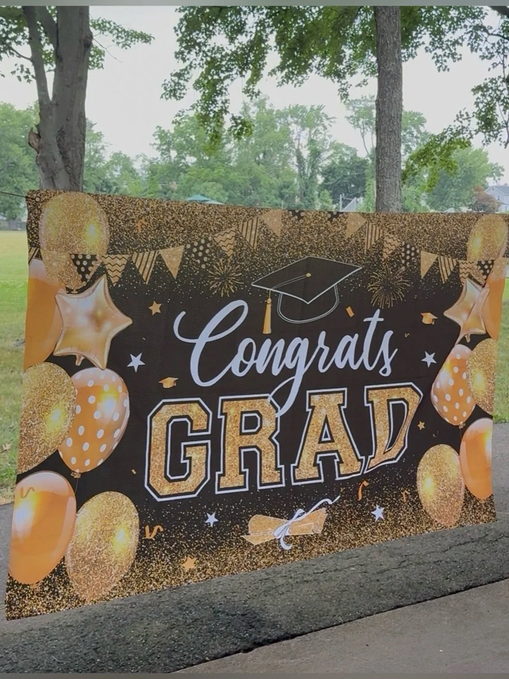 Congrats Grad Banner in Black and Gold 70”w X 43.5”h